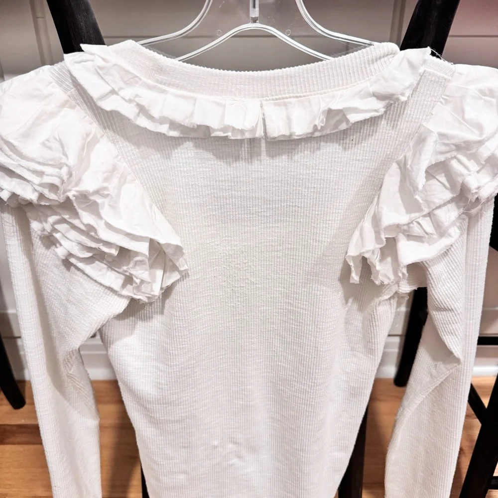 Free people what a ruffle top Size M